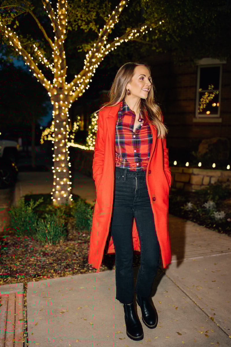 red coat with plaid shirt