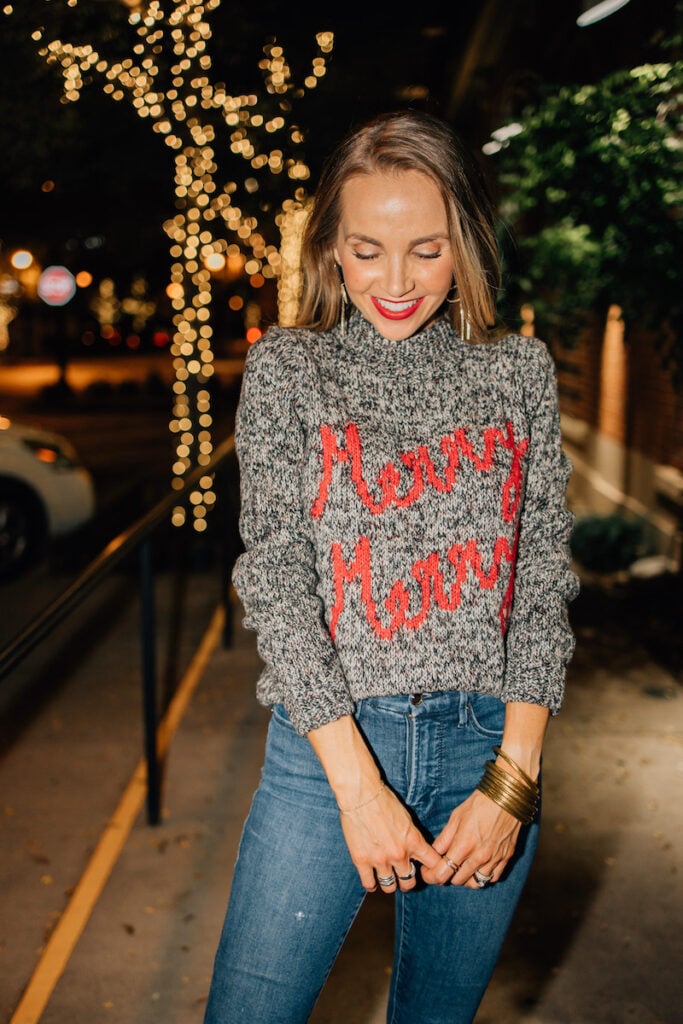 Red lip and merry merry sweater