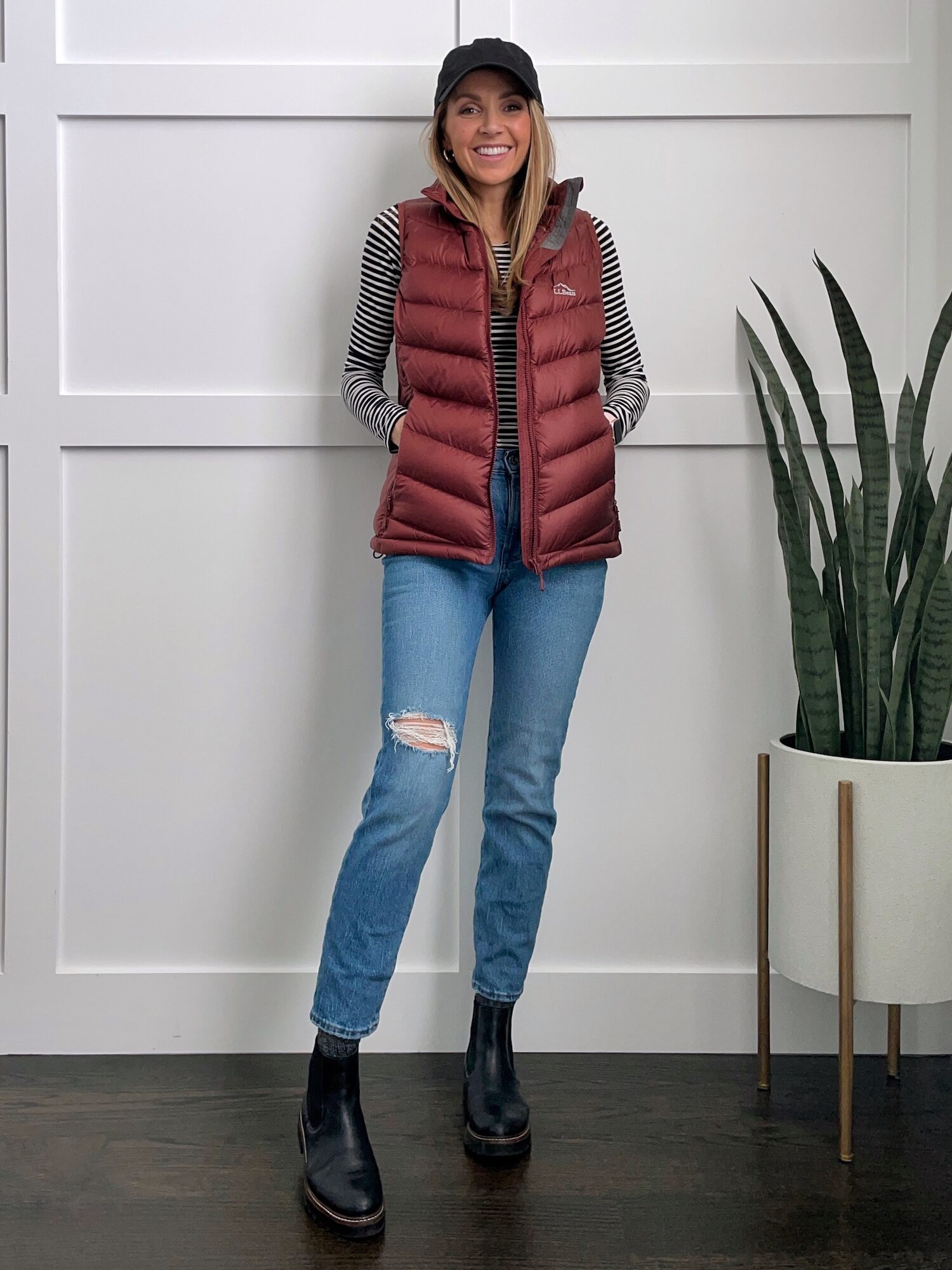 Puffer Vest with Jeans and Ball Cap