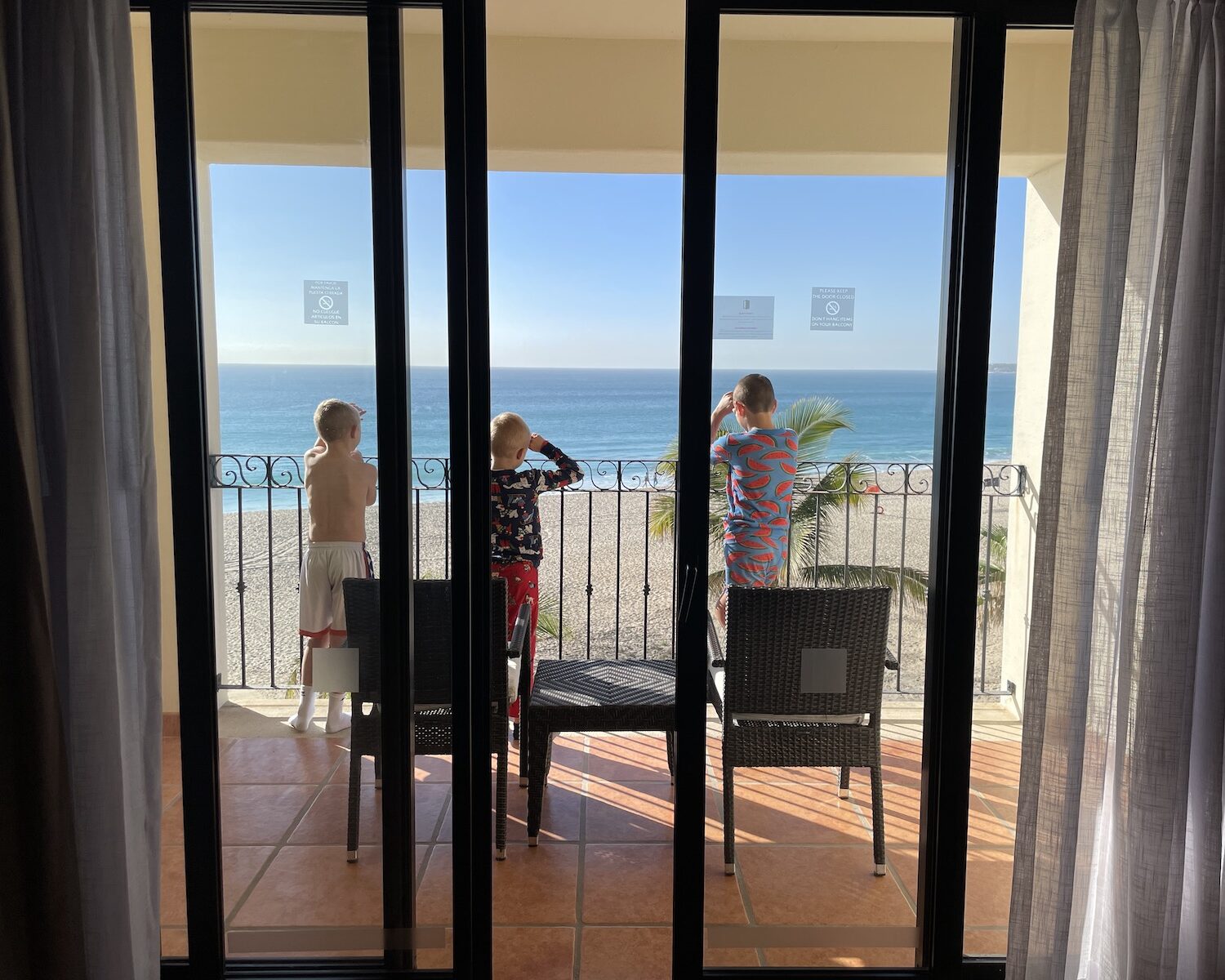 morning boys hotel balcony