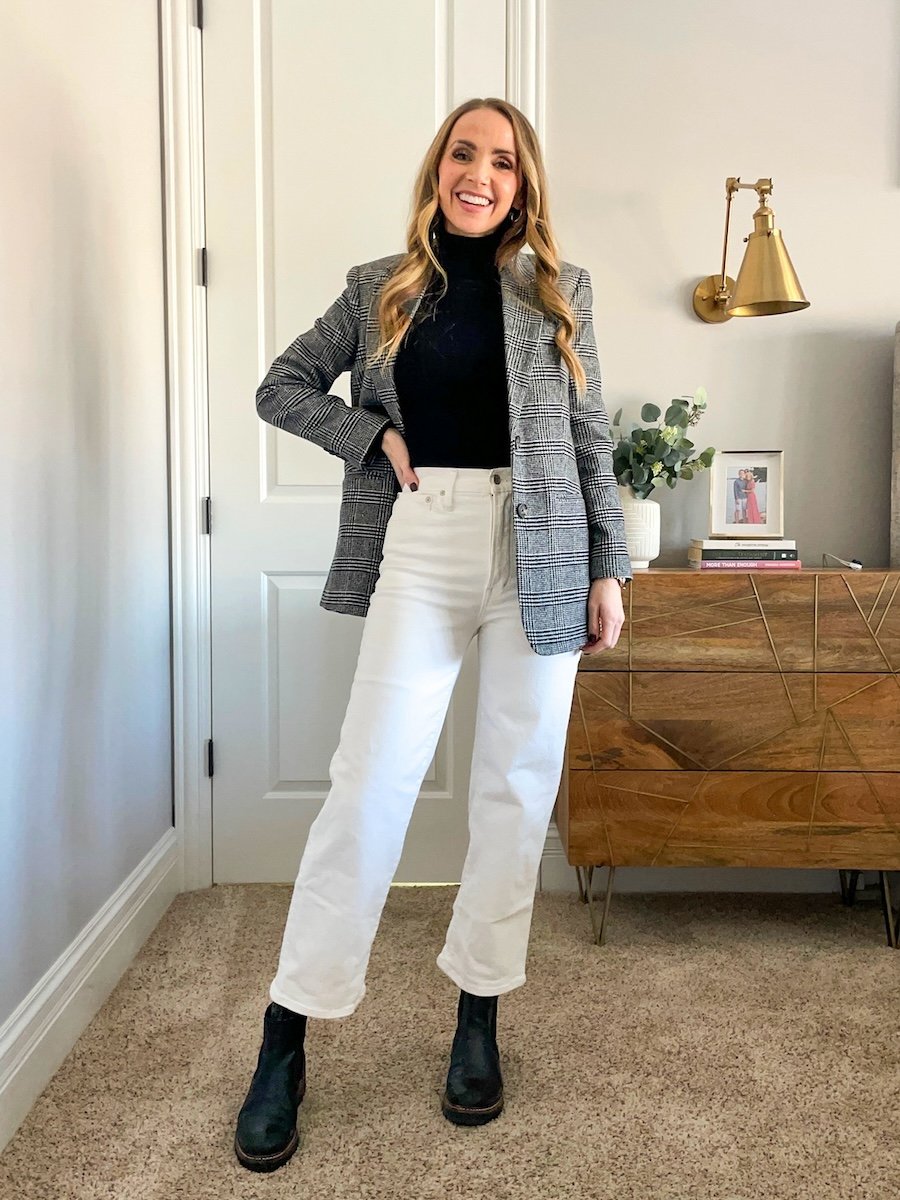 black turtleneck with white jeans